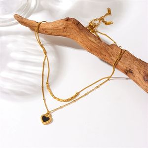 שרשרת כפולה מצופה זהב עם תליון בצורת לב שחור ולבן ושרשרת נירוסטה - Product Image 4