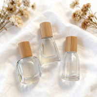 Bouteille à bille en verre transparent de 10ml avec couvercle en bambou et bouteille de parfum d'huiles essentielles de forme spéciale de rouleau en acier à vendre