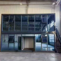 Maison conteneur préfabriquée modulaire en acier de 20 pieds avec mur rideau en verre pour bureau, studio, jardin, extérieur