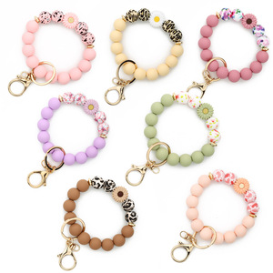Personalized <b>Silicone</b> <b>Beaded</b> Keychain Bracelet with Daisy Charm and Carabiner Clasp Halloween-Themed High Quality Pastel Colors - Product Image 1