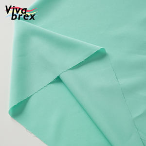 2025 gran oferta precio competitivo tejido sólido 95% poliéster 5% Spandex 100D tela elástica de cuatro vías para trajes de niñas - Product Image 1