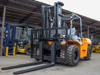 Chariot élévateur diesel CPCD70-G en promotion avec 4 roues motrices et fourches de 1220 mm pour les magasins de matériaux de construction