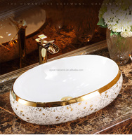 Comptoir de luxe WC Vanité en céramique dorée Lavabo de salle de bain au-dessus du montage Installation Couleur or Lavabo à main