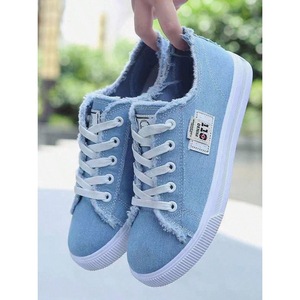 Sneakers in tela slip-on semplici e moderne per uomo e donna, scarpe leggere e traspiranti con lacci per studenti - Product Image 1