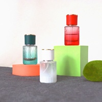 Vaporisateur de parfum de 30ml 50ml 100ml Flacon de parfum vide en verre de forme ronde transparent avec bouchons multicolores