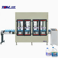Machine de remplissage pneumatique de liquides Javelle pour bouteilles en verre/plastique, entièrement automatique avec bouchage et emballage