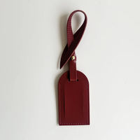 Étiquette de bagage en cuir PU lisse anti-perte pour sacs à dos et valises de voyage, accessoire de charme, vente chaude