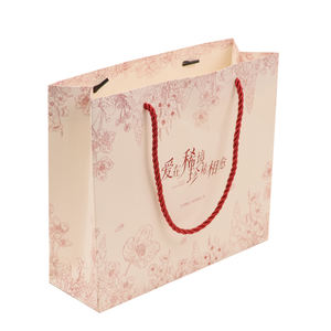 Bolsas de Regalo de Papel Blanco Especial Ecológicas y Reciclables de Alta Calidad para Ropa, Compras y Souvenirs con Asas - Product Image 1