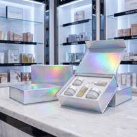 Boîte cadeau de luxe personnalisée en carton rigide à charnières pour produits de soin, avec insert découpé argenté holographique, emballage beauté