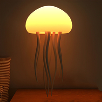 Lampe Méduse Flottante RGB à Capteur, Commande Vocale, Rechargeable USB, Veilleuse à Intensité Variable, Aide au Sommeil, Ambiance Chambre