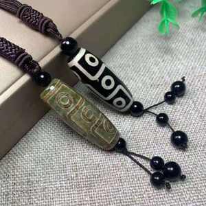 Venta al por mayor negro tibetano antiguo 9 ojos Viejo Gran Dzi cuentas antiguas cuentas de ágata tibetana para colgante - Product Image 1