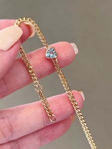 Bracelet en or véritable 18 carats avec cœur en aquamarine et maillons cubains de Xinfly Fashion Jewelry - Product Image 4