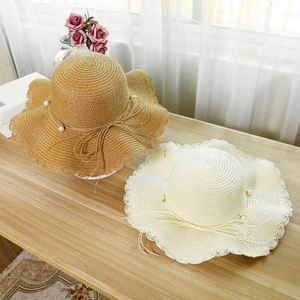 Female Summer Wave Brimmed Pearl Straw Hat <b>Sunscreen</b> Beach Sun Hat for Women - Product Image 2