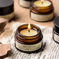 Vente en gros de bougie parfumée à la cire de soja en cire de noix de coco dans un pot à bougie en verre ambré avec couvercle Bougies parfumées de luxe de marque privée