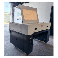 Machine de découpe laser Co2 CNC à position automatique 6090 avec caméra Ccd et rotative