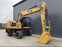 Excavatrice sur roues Caterpillar M318F d'occasion, godet de 0,91 m³, vitesse routière de 35 km/h, excellent état, directement de l'usine