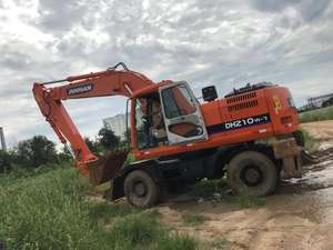 État de marche Utilisé 21ton Pelle Sur Pneus Doosan DH 210W -7 Pour Vente - Product Image 3