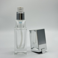 Pompe de traitement d'échelle en argent de haute qualité avec bouchon en argent pour bouteille en verre transparent transparent de 30ml 18mm