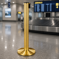 Poteau de guidage en aluminium doré poli avec barrière à sangle rétractable pour la gestion des files d'attente dans les aéroports, hôtels et événements