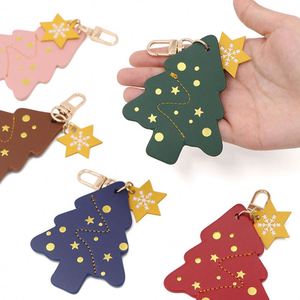 Stocked Creative Pu Leather Christmas Tree Keychain Gold Stamping Pendant Charms Women Backpack Welcome Business <b>Gifts</b> Portable - Product Image 1