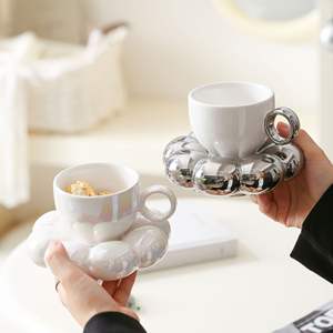 شحن سريع لأكواب قهوة من السيراميك، طقم كوب وصحن شاي بعد الظهر بتصميم نورديك بلون الماكرون الوردي على شكل زهرة دوار الشمس مع قاعدة أكواب بتصميم زهرة دوار الشمس - Product Image 3