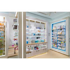 Étagères de <span class=keywords><strong>pharmacie</strong></span> blanches avec lumières, décoration de meubles de magasin de <span class=keywords><strong>pharmacie</strong></span> personnalisé, boîte d'éclairage supérieure, exposition murale de médecine à vendre - Product Image 5