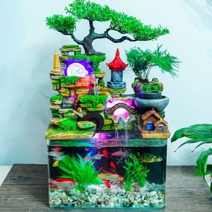 Offrant de grands aquariums avec plantes aquatiques, des rochers artificiels, de l'eau courante, des roues à eau Feng Shui et des poissons décoratifs - Product Image 1
