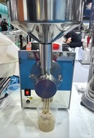Machine à pâte de sésame Tahini Machine à broyer le beurre de cacahuètes Moulin à broyer commercial 80KG/H Machine à broyer les noix Machine à pâte de pistache