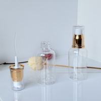 Flacon pompe rond transparent à épaulement lisse pour pulvérisateur doré, 50ml, 80ml, 100ml, emballage cosmétique vide, flacons rechargeables