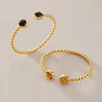 Bracelet manchette torsadé J&D Designer Vintage en acier inoxydable plaqué or 18 carats PVD avec ambre en résine naturelle