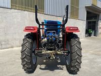 Tracteur rotatif JJZG JJ-304 4x4 avec attelage trois points, direction hydraulique, cabine fermée, moteur 18,4 kW 1600 cm³, largeur de travail 1400 mm