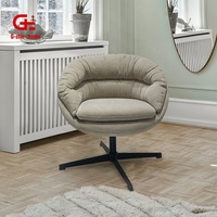 Fauteuil pivotant de luxe moderne en tissu capitonné avec repose-pieds et base métallique pour salon ou chambre à coucher, style détente