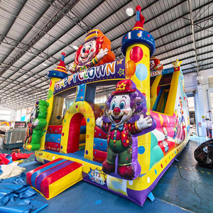 Toboggan gonflable géant à double voie pour enfants, idéal pour les fêtes foraines et les événements, avec des décorations de clown joyeux. - Product Image 2