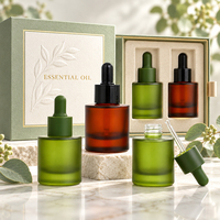 Flacon d'huile essentielle vert givré personnalisé de 300 ml avec bouchon à vis et flacon compte-gouttes en verre cosmétique avec boîte d'emballage