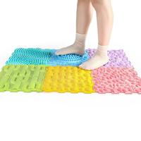 Tapis de jeu sensoriel coloré en silicone multifonctionnel à texture apaisante et tactile pour la thérapie de l'autisme