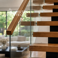 Escalier mono-à-capitère sur mesure, design architectural minimaliste intérieur, fabrication professionnelle et ingénierie