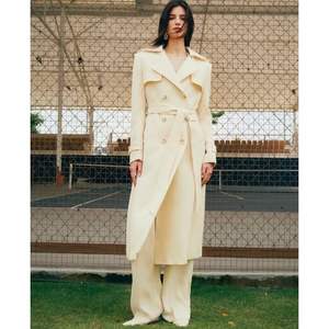 ชุดเทรนช์โค้ทสำหรับผู้หญิงคอลเลคชั่นฤดูใบไม้ร่วงเสื้อผ้ายาวใส่สบายสไตล์หรูหราผลิตจากเวียดนาม - Product Image 1