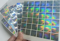 Étiquettes d'emballage anti-contrefaçon personnalisées en argent PET, holographiques fluorescentes à effet de vide, résistantes à l'huile pour téléphones mobiles et écouteurs
