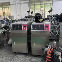 Machine de scellage par induction refroidie à l'eau haute puissance Zhongjie, scelleuse automatique en acier inoxydable 304 pour l'emballage alimentaire et chimique