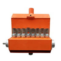 Machine manuelle de marquage routier pour la pose de billes réfléchissantes, avec pompe distributrice réglable pour billes de verre, pour la gestion du trafic et la construction