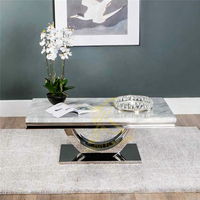 Table basse moderne en marbre doré de qualité supérieure avec structure en acier inoxydable, design populaire pour salon