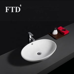 <span class=keywords><strong>Lavabo</strong></span> ovale en céramique fine <span class=keywords><strong>de</strong></span> style moderne, blanc mat, pour hôtel, <span class=keywords><strong>lavabo</strong></span> pour les mains, évier en porcelaine émaillée blanche - Product Image 1