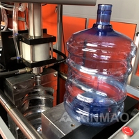 Préforme semi-automatique Alimentation manuelle PET Bouteille d'eau Soufflage Moding Machine de soufflage