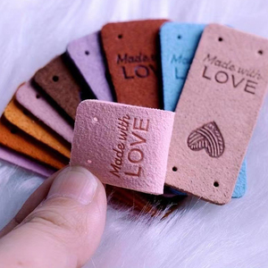 High Quality Eco-Friendly Custom Logo Embossed PU <strong>Leather</strong> Tag <strong>Labels</strong> Roll Shape for Garment Accessories <strong>Jeans</strong> Caps - Product Image 1