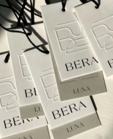 Etiquetas de ropa con logotipo de marca privada personalizada Etiquetas colgantes oscilantes con código de barras para tamaño de ropa Material de papel Etiquetas de precio de venta