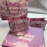 Ventes en gros pour l'emballage de cadeaux avec poignée en coton, impression de logo rose, sacs en carton blanc, emballage de sacs en papier cadeau