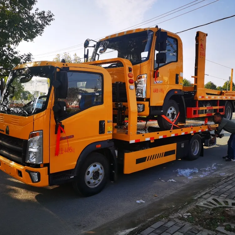 Kualitas Cina truk derek HOWO 5T mobil pembawa trailer penghancur truk kendaraan penyelamatan Jalan