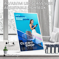 Support de panneau publicitaire LED ultra-mince en verre trempé rectangulaire A2/A3/A4 avec éclairage réglable en aluminium pour magasin et usine