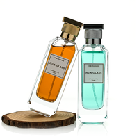 Botella de Perfume Recargable Vacía de 100 ml con Base Gruesa a Bajo Precio, Etiqueta Personalizada, Tapa Rectangular de Aleación de Zinc Zamac con Pulverizador Fino