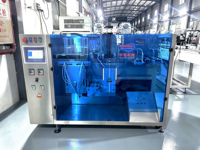 Machine d'emballage horizontale à 3 stations pour sachets préformés, à large application, pour le remplissage de liquides alimentaires et l'emballage de sacs